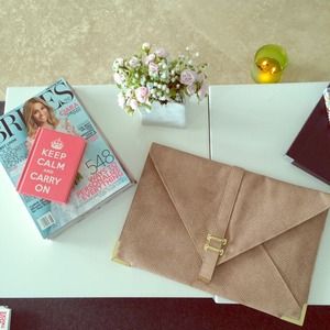 Asos clutch in blush pink.