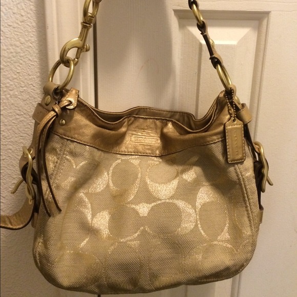 reduced price!!!authentic coach gold purse