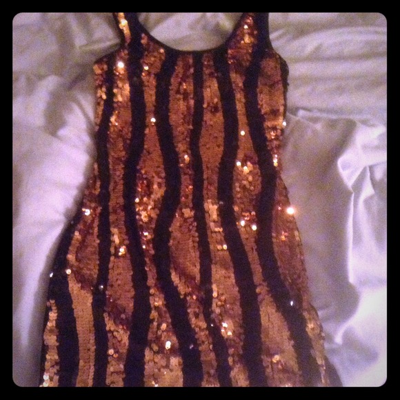 Black and gold sequence dress