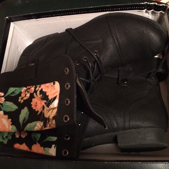 Black combat boot with floral cuff fold over