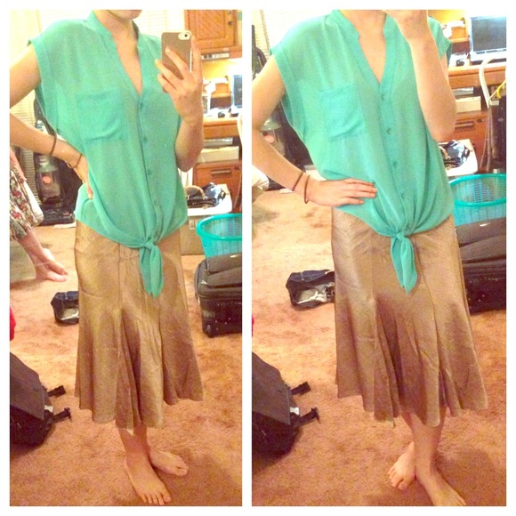 Metallic gold knee-length skirt