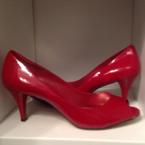 Red patent peep toe pumps