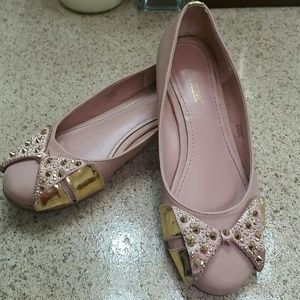 Unique statement flats blush with gold accents