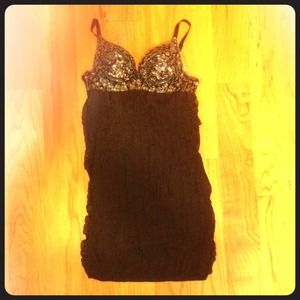 Sequined little black dress