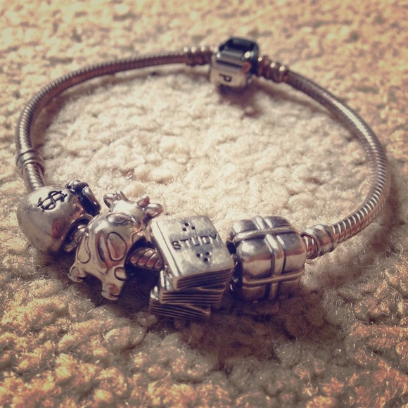 Pandora present and book charm bracelet.