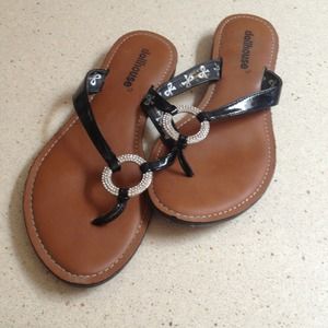Almost new black jeweled flip flops.