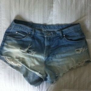 Hand distressed men's wranglers.