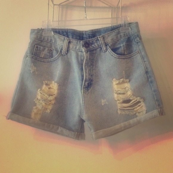SOLD High waisted TWX distressed denim shorts.
