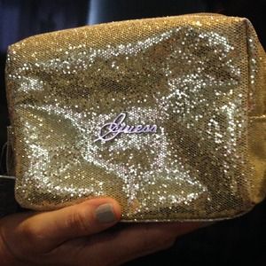 Gold guess makeup bag!