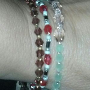 Three small beaded bracelets