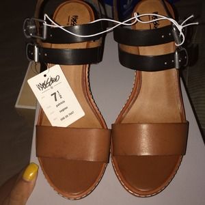 Brand new tan and black wedges
