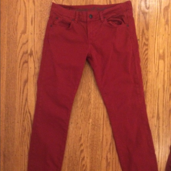 Dark red articles of society jeans
