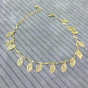 Gold anklet with leaf motif
