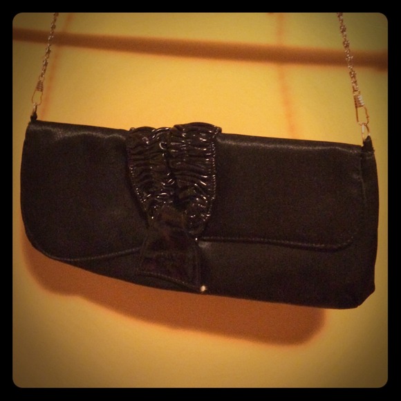 WILL BE DONATED IF NOT SOLD Black small bag