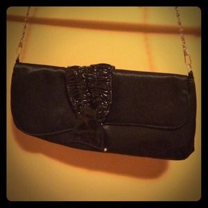 WILL BE DONATED IF NOT SOLD Black small bag