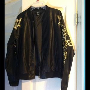 Faux leather jacket with gold detail on sleeves