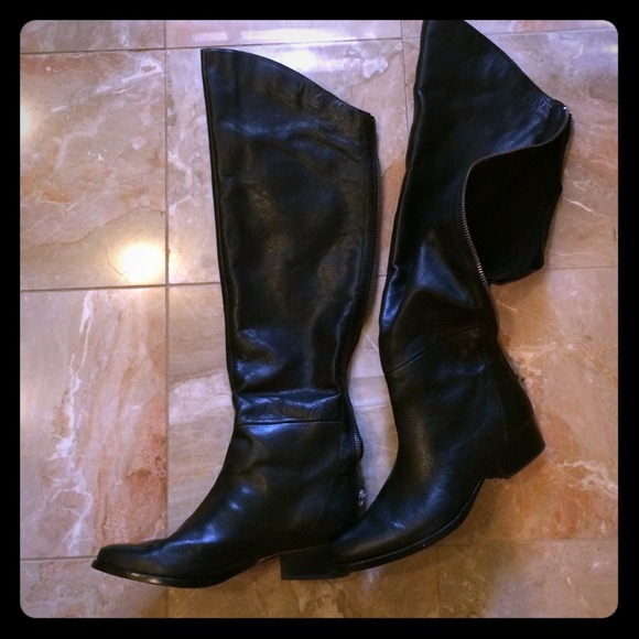 Dolce Vita over the knee black leather boots.