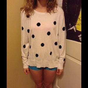 White with black polka dot sweater.