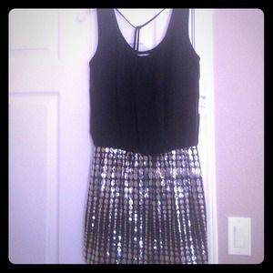 Black party dress with sequin skirt
