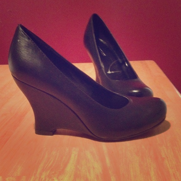Adorable wedges. Black. Brand new. Never worn.