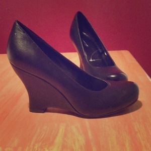 Adorable wedges. Black. Brand new. Never worn.
