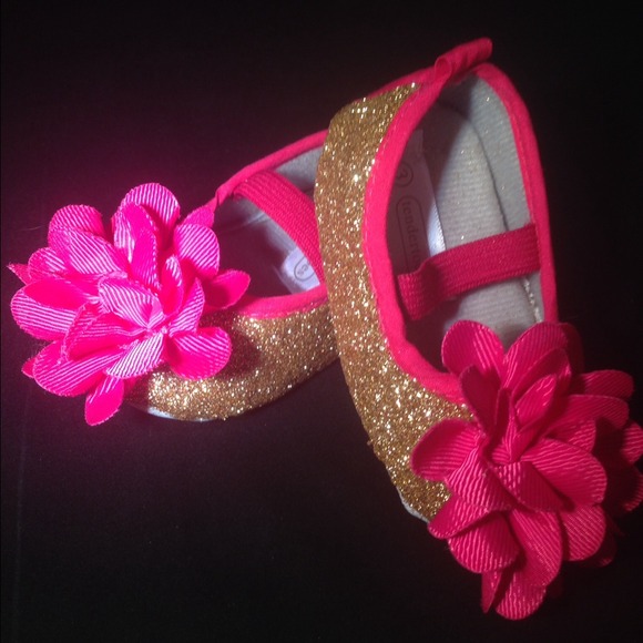 Infant size 3 gold glitter shoes with pink bow!