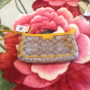 Authentic large coach wristlet