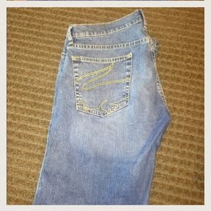 Lacoste jeans. Boot cut. Gator on back pocket.