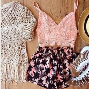 Looking for this knit floral fringe long sleeve