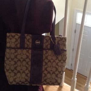 Beautiful brown and purple coach purse.