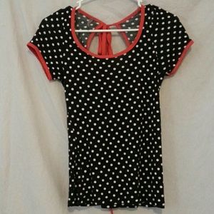 white polka dotted top