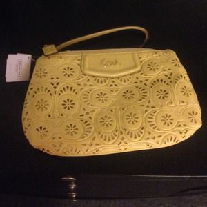 Yellow Coach wristlet.