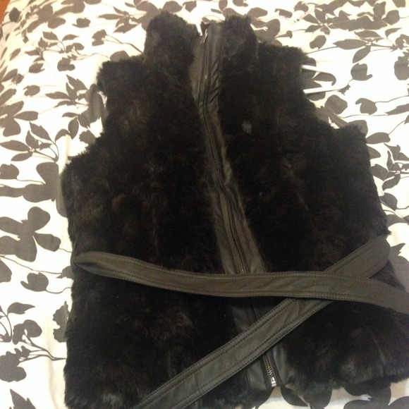 Faux fur vest with faux leather trim- NWT