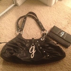 Black stuffed Guess purse