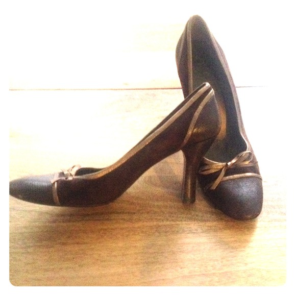 Brown and gold pumps