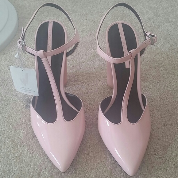 Pink high heel court shoe with ankle strap