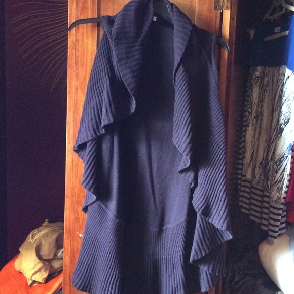 A purple sweater vest size XL