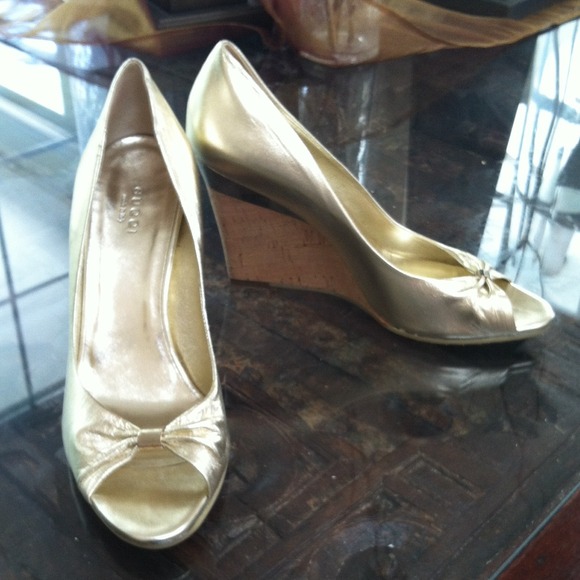 Beautiful pair of gold shoes