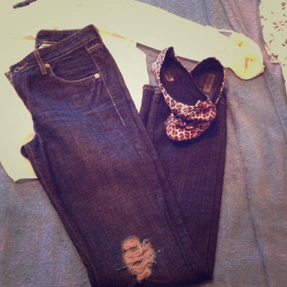 Dark blue distressed jeans