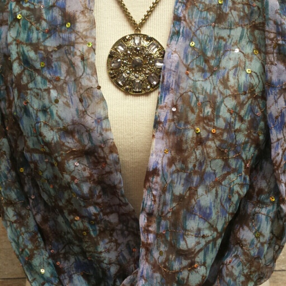 Scarf or could be shawl and necklace.