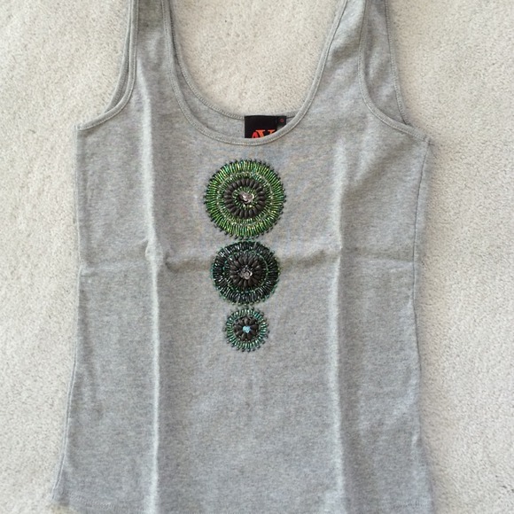 Tops - Sparkly tank top .wear any season .