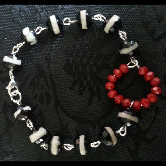 Red, black and white bracelet