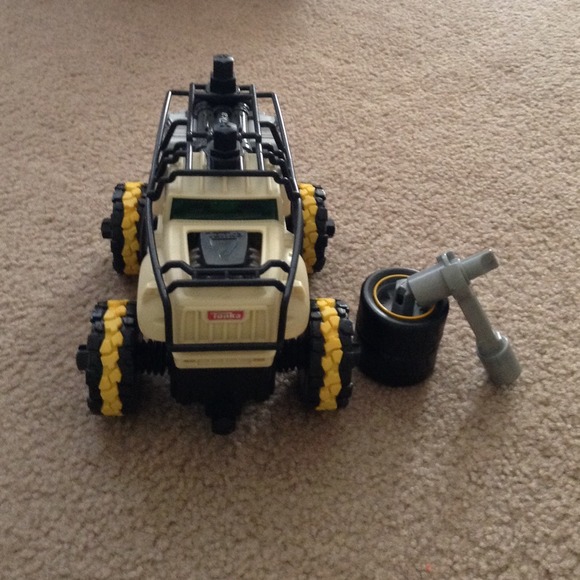 A car with hammer and extra wheels