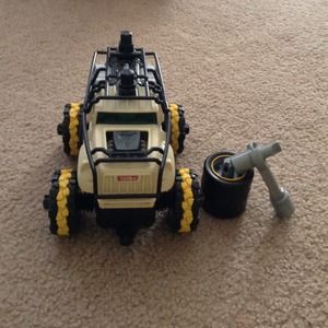 A car with hammer and extra wheels