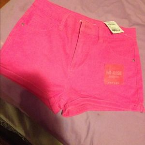 Hot pink shorts. High rise.