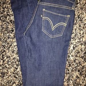 Levi's dark washed denim skinny jeans.