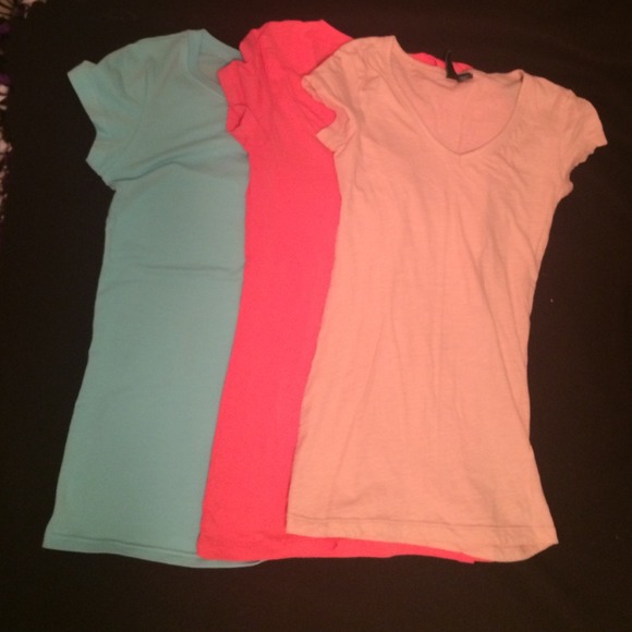 Three solid color t-shirts