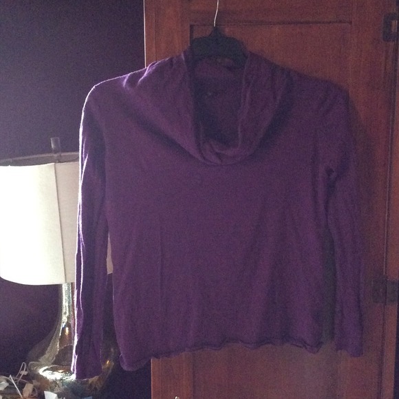 A purple turtle neck size XL