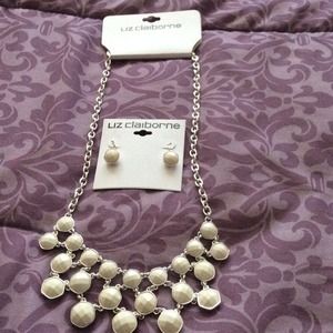 Necklace with matching ear rings.