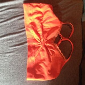 Bright orange sports bra